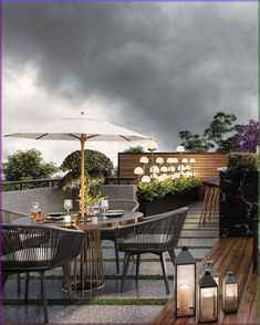 an outdoor dining area with tables, chairs and umbrellas on the roof top deck