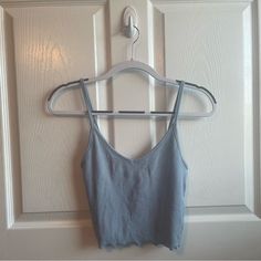 Light Blue V-Neck Tank Top From Pacsun. It Is New With Tags, Has Never Been Worn, And Is In Perfect Condition. Seamless V-neck Tank Top For Day Out, Seamless V-neck Crop Top For Day Out, Light Blue V-neck Tank Top For Summer, Blue Summer Crop Top Tank, Casual Blue V-neck Crop Top, Blue Tank Crop Top For The Beach, Blue Tank Crop Top For Beach, Light Blue Seamless Tank Top For Spring, Light Blue Cami Crop Top For Summer