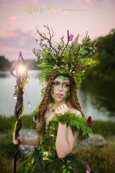 A magical flower branch antler HEADDRESS with butterflies, handmade mushrooms, vines and ferns in lush greens.  Ideal for an Earth Goddess, Jungle Queen, a woodland wedding, fairy cosplay, photo shoots and special events. This large statement jungle headdress, is a rain forest green headdress with green branches resembling antlers stemming out. There are also realistic looking butterflies, vines and mushrooms scattered throughout. This very detailed piece definitely makes a statement and leaves Goddess Of The Earth, Mother Nature Cosplay, Forest Goddess Makeup, Gaia Goddess Costume, Mother Earth Costume Diy, Mother Earth Halloween Costume, Fairy Garden Costume, Mother Earth Makeup, Forest Headpiece