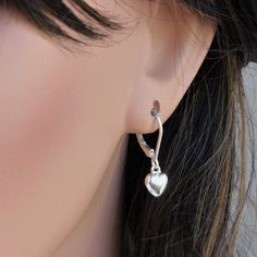 Sterling silver leverback Earrings. Sterling silver puff heart dangle earrings. IT is made with ... -Sterling silver 7mm Heart puff Charm, -Sterling silver Lever back , -Come up with small ribbon gift Box, -One set of care instruction package that enhance your present. More Earrings https://www.etsy.com/shop/rainbowearring?ref=listing-shop2-all-items-count§ion_id=11379567 PET JEWELRY https://www.etsy.com/shop/rainbowearring?search_query=paw+print ★How to Care Sterling Silver . ~The best thing yo Elegant Hoop Heart Charm Earrings, Dainty Heart Charm Hoop Earrings, Anniversary Heart Charm Dangle Hoop Earrings, Dainty Sterling Silver Hoop Earrings With Heart Charm, Anniversary Dangle Hoop Earrings With Heart Charm, Valentine's Day Heart Charm Dangle Hoop Earrings, Valentine's Day Dangle Hoop Earrings With Heart Charm, Dainty Hoop Heart Earrings For Anniversary, Dangle Hoop Earrings With Heart Charm For Gift