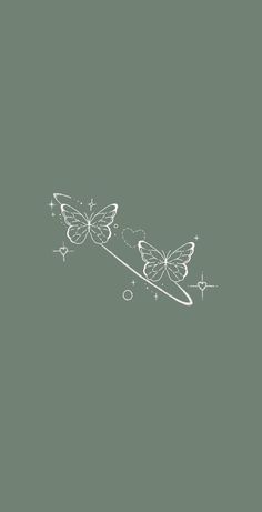 two butterflies flying over each other on a gray background with white stars and sparkles