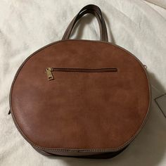 Nwt Jen & Co Brown Vegan Handbag, Round With Flat Bottom., Very Cute! Zipper Closure Plus Snap Section On Each Side And Zipper Pocket Inside. 13 In Wide, 12 1/2 Tall, 3 3/4 Inches Width At Bottom. Attachable Shoulder Strap Plus Hand Held Straps Permanently Attached. Brown Satchel With Round Handle For On-the-go, Brown Bag With Removable Pouch And Round Handle, Brown Satchel With Removable Pouch And Round Handle, Brown Hobo Bag With Round Handle For Shopping, Brown Satchel With Round Handle For Everyday, Brown Shoulder Bag With Round Handle, Brown Shoulder Bag With Round Handle For Everyday, Brown Satchel With Round Handle For Travel, Brown Bag With Round Handle For On-the-go