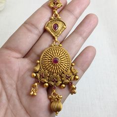 Fine Quality Gold-plated Maang Tikka is an antique Indian bridal jewelry piece, inspired by temple jewelry. Perfect for weddings, this forehead accessory is ideal for Pakistani bridal looks. Its traditional design and intricate craftsmanship make it a timeless gift for her, adding elegance to any special occasion. *𝐏𝐑𝐎𝐃𝐔𝐂𝐓 𝐃𝐄𝐓𝐀𝐈𝐋* * Material: Brass * Plating: Gold Plated *𝐃𝐈𝐌𝐄𝐍𝐒𝐈𝐎𝐍𝐒* *    Weight 18 gm Each, Length 2.2 Inches, Width 1.5 Inches, Top Chain Length: 2.6 Inches Gold Temple Jewelry Tikka As Gift, Temple Jewelry Tikka With Intricate Design As Gift, Gold Tikka With Latkans Temple Jewelry, Yellow Gold Temple Jewelry Tikka For Festive Occasions, Ceremonial Gold Chandbali Tikka, Wedding Temple Jewelry Chandbalis In 22k Gold, Wedding Temple Jewelry Chandbalis In Brass, Wedding Temple Jewelry Style Brass Chandbalis, Festive Yellow Gold Tikka In Temple Jewelry Style