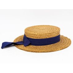 The Ridgemont Make's vintage 1950s boater hat showcases timeless elegance with its natural straw construction. Adorned with a navy blue ribbon and bow, this hat epitomizes classic style. The sturdy yet lightweight straw provides comfort and durability, while the charming ribbon adds a touch of sophistication. This boater hat captures the essence of vintage summer fashion, making it a coveted accessory for collectors and design enthusiasts alike. Some staining. Wear consistent with age and use. 1 Short Brim Boater Hat With Ribbon For Garden Party, Curved Brim Boater Hat With Ribbon For Garden Party, Brimmed Boater Hat With Ribbon For Garden Party, Boater Hat With Ribbon For Garden Party, Garden Party Boater Hat With Ribbon And Curved Brim, Kentucky Derby Fedora Boater Hat With Ribbon, Brimmed Boater Hat With Bow For Garden Party, Vintage Hat Bands For Beach With Flat Crown, Short Brim Boater Hat With Bow For Garden Party