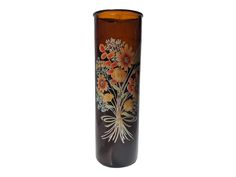 a brown vase with flowers painted on the front and sides, sitting against a white background