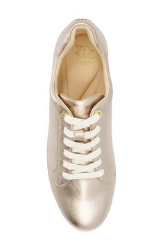 A padded heel and low-profile silhouette distinguish a street-savvy sneaker lofted by a chunky platform for statement-making appeal. 2" platform Synthetic or textile and synthetic upper/synthetic lining and sole Imported Casual Gold Low-top Platform Sneakers, Sporty Gold Platform Sneakers With Round Toe, Gold Low-top Platform Sneakers, Gold Low-top Sporty Platform Sneakers, Gold Platform Sneakers With Round Toe, Sporty Platform Sneakers With Metallic Logo, Low-top Leather Platform Sneakers With Metallic Logo, Gold Casual Sneakers With Metallic Logo, Casual Gold Sneakers With Metallic Logo