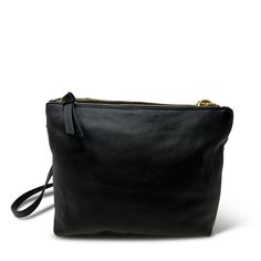 We can't get enough of our new silhouette in the lush, black shearling and butter soft black leather. We're absolutely smitten and head over heels with the Nottingham. Take a walk on the practical side with this sectioned handbag that's exceptional for staying organized. Arrange your passport, season tickets to the Giants, concert and movie tickets, driver's license in any one of the zip compartments. Work it like a mini filing system or a beloved PA, faithfully at your side, finding everything Monica Castiglioni, Black Leather Pouch With Adjustable Strap, Black Bag With Snap Closure For On-the-go, Black Rivet Crossbody Bag, Black Leather Box Bag With Gold-tone Hardware, Black Wallet With Gold-tone Hardware Crossbody, Season Ticket, Head Over Heels, Filing System