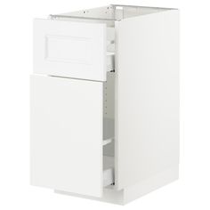 a white cabinet with two doors and drawers on the bottom, in front of a white background