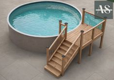 an above ground swimming pool with steps leading up to the deck and hot tub in the background