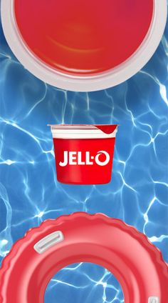 an image of a pool with a red floater and a jello drink in it