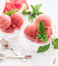 two bowls filled with watermelon and mint ice cream