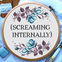 a cross - stitch pattern with the words screaming internally on it, surrounded by other items