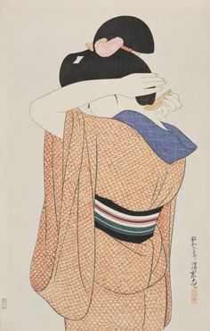 an image of a woman with her head wrapped up in a kimono, looking down at the ground