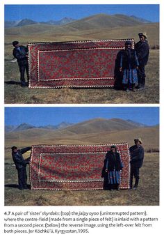 two men standing next to a large rug in the desert with mountains in the background