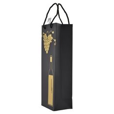 a black paper bag with gold foil on the side and a wine bottle in it