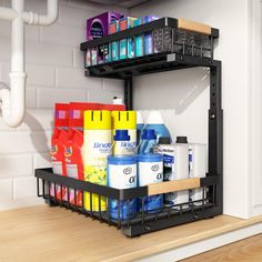 an organized shelf in the kitchen with cleaning products