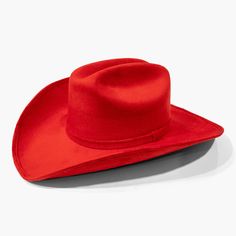 Red Cowboy Hat by AB.LINO Western meets contemporary. Our take on a western classic, made from the same materials used on our flagship rancher hat. Trimmed with a Minimal Mexican Suede Hat Band. Made from stiffened Mexican suede Spot / specialist clean Brim width: 4″ / 10.16 cm Crown height: 4″ – 4.75″ Rigid crown design Please note: due to the color and nature of the suede dyeing process, some flecking or marks may be present in material Size & Fit: Our Cowboy hat is designed one-size-fits most Red Western Fedora For Kentucky Derby, Western Style Red Fedora With Short Brim, Red Western Fedora With Short Brim, Classic Red Hat With Flat Brim, Classic Red Top Hat With Flat Brim, Classic Red Flat Brim Hat, Western Red Fedora Felt Hat, Red Western Fedora Felt Hat, Western Style Red Fedora Felt Hat