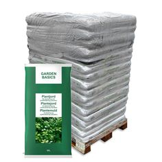 a stack of pallet bags sitting on top of each other next to a bag of plants