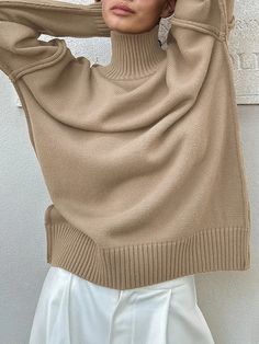 UOOZEE Cozy Khaki Sweater For Fall, Winter Khaki Knit Sweater, Cozy Khaki Winter Sweater, Cozy Beige Acrylic Top, Khaki Long Sleeve Sweater For Layering, Cream Solid Winter Sweater, Beige Solid Color Winter Sweater, Trendy Khaki Winter Sweater, Beige Crew Neck Acrylic Top