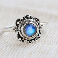 Sterling Silver Round Moonstone Ring With Moon Phase, Bohemian Sterling Silver Moonstone Ring, Moonstone Ring With Moon Phase For Gift, Adjustable Moonstone Ring As Birthstone, Spiritual Sterling Silver Round Birthstone Ring, Blue Moonstone Stackable Ring, Blue Stackable Round Moonstone Ring, Blue Round Stackable Moonstone Ring, Adjustable Stackable Round Moonstone Ring