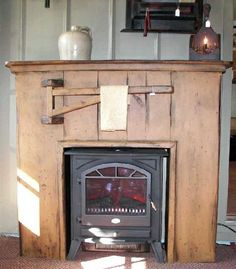 an old fashioned fireplace in a living room