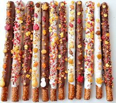 many different types of candy sticks lined up together