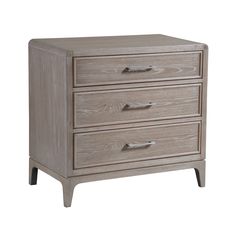 the three drawers are made from wood and have metal pulls on each drawer, which is also