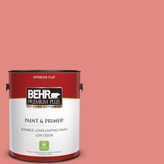 a pink paint with the words behr premium plus on it