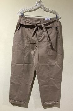 INC Women Khaki High Rise Tie-Front Cropped Tapered  Leg Pants Sz 16 Reg NWT  Stunning Pants with Tie Closure detail in the front Super soft cotton blend fabric  Zipper / Button Closure  2 Pockets  Flat Front  New with Tags  Measurements laying flat: Waist 18" Inseam 27" Leg Opening 8" Cotton Blend Fabric, Outfits Casual, Cargo Shorts, Leg Pants, Parachute Pants, High Rise, Casual Outfits, Cotton Blend, Women Accessories