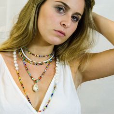 "Bright, vibrant beads make this necklace perfect addition to your summer sundress or a white blouse. African glass beads and white freshwater pearls are hand knotted along the silk cord to create a colorful and bright strand. Alone or layered with your favorites, this necklace exudes a playful, eclectic bohemian elegance. Necklace: 43\" Layer this necklace with: https://www.etsy.com/listing/637252353/baroque-pearl-and-turquoise-necklace?ref=shop_home_active_2 You might also like: https://www.et Adjustable Pearl Charm Necklace For Vacation, Pearl Chain Necklace For Beach, Adjustable Pearl Charm Necklaces For Vacation, Summer Beach-appropriate Pearl Chain Necklace, Bohemian Pearl Charm Necklace For Vacation, Bohemian Necklace With Pearl Charm For Vacation, Bohemian Beach Jewelry With Pearl Chain, Bohemian Pearl Chain Necklace For Beach, Bohemian Pearl Charm Jewelry For Vacation