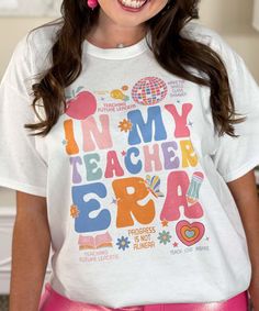 Introducing our "In My Teacher Era Graphic Shirt," a stylish and empowering choice for educators ready to embrace their teaching journey. Available in sizes S through 5XL, this shirt comes in short sleeve, long sleeve, and sweatshirt options, making it perfect for any season and occasion.
Crafted from high-quality, soft materials, this shirt ensures all-day comfort, making it ideal for school days, educational events, or casual wear. The "In My Teacher Era Graphic Shirt" celebrates the dedication and passion of teachers, making it a fantastic addition to your back-to-school wardrobe.
Showcase your pride and enthusiasm for teaching with this versatile and comfortable graphic shirt. Whether you're preparing for the new school year, attending a teacher conference, or simply expressing your lo Back To School Outfits For Kids, Teacher Conferences, Teaching Shirts, Monogram Shirts, Teacher Outfit, The New School, Inspirational Shirt, Back To School Outfits, Teacher Tshirts