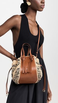 Ulla Johnson Gio Crossbody Bag | Shopbop Luxury Brown Shoulder Bag With Tassels, Luxury Travel Shoulder Bag With Tassels, Chic Top Handle Shoulder Bag With Tassels, Designer Bags With Tassels, Chic Straw Bag With Tassels, Heeled Rain Boots, High Heel Rain Boots, Woven Raffia, Shoe Boot Sandals