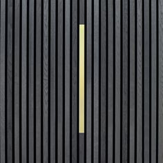 a close up of a door with vertical lines on it