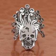 Fantasy Rings For Halloween Gift, Silver Adjustable Spiritual Skull Ring, Adjustable Silver Skull Ring In Spiritual Style, Adjustable Silver Skull Ring Spiritual Style, Unique Sterling Silver Halloween Rings, Unique Sterling Silver Rings For Halloween, Collectible Symbolic Skull Ring For Halloween, Unique Silver Rings For Halloween, Unique Halloween Collectible Skull Ring