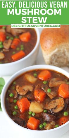 two white bowls filled with vegetable stew on top of a green tablecloth and bread in the background