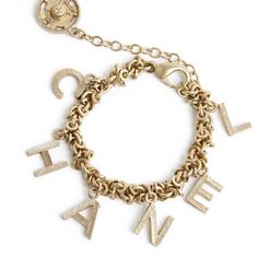 Chanel Tassel Vintage Letter Charm Bracelet I Am Original Owner Chanel Collection Vintage Fall Winter 02~2003 Bracelet In Matte Gold Metal, Composed Of A Chain With Round Links And Tassels With Chanel Letters, Fastening With A Carabiner On A Chain Ending With A Sewing Snap Decorated With The Cc Logo. Length Of The Bracelet 17 Cm Excluding The Chain And 23.5 Cm With It, Width Of The Chain 1 Cm, Dimensions Of The Plate 5.4 X 2.35 Cm. This Bracelet Is Stunning And Perfect With Other Chain Bracelets Letter Charm Bracelet, Chanel Collection, Bag Chanel, Letter Charm, Chain Bracelets, Chanel Vintage, Chanel Jewelry, Vintage Fall, Vintage Lettering