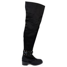 100% authentic Chanel interlocking cut-out over-knee boots in black satin and leather. The design features a cut-out with suede laces, grosgrain cap toe and trim, gold-tone hardware and a stacked block heel. Opens with a zipper on the back. Have been worn and are in excellent condition. 2016 Fall/Winter Measurements Model 16K G32253 Imprinted Size 39 Shoe Size 38.5 Inside Sole 25.5cm (9.9in) Width 7.5cm (2.9in) Heel 5cm (2in) Shaft 69cm (26.9in) Top Circumference 41cm (16in) Hardware Gold-Tone A Chanel Boots Farfetch, 2016 Fall, Suede Lace, Chanel Black, Chanel Shoes, Boots Shoes, Over The Knee Boots, Black Satin, Knee Boots