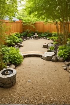 a garden with rocks and plants around it