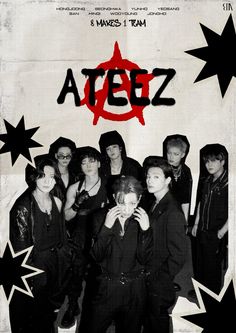 a group of young men standing next to each other in front of a poster with the word ateez on it