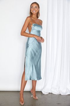 This satin empire waist midi dress is perfect for any special event. It boasts a cowl neck and a tied open back, with a side invisible zipper for easy dressing. It provides a modern, elegant look and comfortable fit. Recommended sizing XS - 0-2, S - 4, M - 6, L - 8-10 Solid Backless Midi Dress For Formal Occasions, Solid Color Backless Midi Dress For Formal Occasions, Solid Color Backless Formal Midi Dress, Fitted Satin Midi Dress With Cowl Back, Fitted Midi Slip Dress With Ruched Back, Summer Satin Backless Dress For Dinner, Satin Spaghetti Strap Backless Dress For Dinner, Elegant Satin Midi Dress With Tie Back, Satin Backless Dress With Spaghetti Straps For Dinner