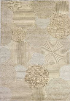 a beige rug with circles on it