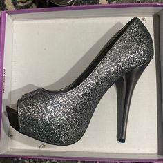 Hot Hot Hot! Delicious Silver/Gunmetal Sparkle Platform Heels. Never Worn! Size 7.5 Silver Shiny Heels For Formal Occasions, Formal Silver Shiny Heels, Silver Heels With 4-inch Round Toe, Silver Heels With 4-inch Heel And Round Toe, Metallic Silver Heels With 4-inch Heel Round Toe, Metallic Silver Heels With 4-inch Round Toe, Metallic Shiny Heels With Round Toe, Glamorous Metallic Silver Heels With Round Toe, Silver Open Toe Heels With Shimmer