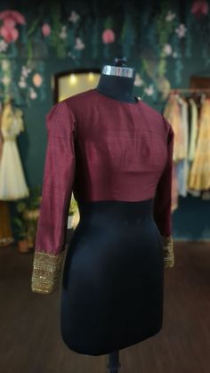 Maroon rawsilk blouse with antique gold hand embroidery Sleeves: full sleeves with embroidery  Neck : front and back t shirt neck  Size: please choose a standard size from the drop down. If you need custom measurements I'll send a detailed measurements chart. Customisation is possible. Please message or leave notes with any personalization. Zari Work Embroidered Top With Traditional Drape For Reception, Silk Embroidered Top For Festive Reception, Festive Silk Embroidered Top For Reception, Long Sleeve Raw Silk Kurta With Zari Work, Elegant Long Sleeve Choli With Resham Embroidery, Fitted Lehenga With Resham Embroidery In Cotton Silk, Anarkali Top With Resham Embroidery For Reception, Elegant Gold Cotton Silk Choli, Semi-stitched Tops With Resham Embroidery For Reception