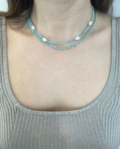 Hello :) I am so happy you stopped by! New designs are added weekly so check back often. All designs are handmade by this mommy.  Shop link ⬇️ https://enjewelrydesign.etsy.com This listing is for (1) turquoise & Pearl necklace.  DETAILS: * Sold as (1) Necklace** please check out the length before purchasing.  * Materials: Natural Turquoise Faceted Gemstone Beads with a  Fresh Water Pearls OR just turquoise beads.   Please note each pearl charm is unique and different in shape and size. And some pearls might have some imperfections.  * **Length: Approximately 15.5" (end to end, including the clasp)  - Please note fit and appearance will vary based on the individual. PLEASE READ BEFORE PURCHASING * NO RETURN/EXCHAGE  * Please contact me within 3 days of delivery if you have any issues with y Handmade Light Blue Beaded Necklace For Summer, Handmade Light Blue Necklaces For Summer, Handmade Light Blue Necklace For Summer, Handmade Turquoise Necklace For Summer, Handmade Turquoise Necklace As Summer Gift, Turquoise Necklace For Summer Gift, Turquoise Necklace Summer Gift, Handmade Blue Necklace For Summer, Summer Turquoise Necklace For Gift