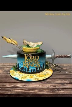 Lord of the Rings
Rings of  Power Lord Of The Rings Cake Birthdays, Lotr Cakes, Lotr Cake, Best Cake Design, Lord Of The Rings Cake, Hobbit Cake, Lotr Party, Hobbit Party, Cake Design Ideas