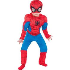 a young boy in a spiderman costume is standing with his hands out to the side