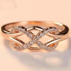 a gold ring with diamonds on it