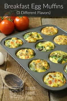 breakfast egg muffins in a muffin tin with tomatoes and eggs on the side