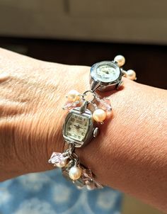 FUN! This is a bracelet made from vintage watches dating from the 1930s and up. There are a variety of watches used; this one includes Helbros 10k RGP, Cramers 17 jewel, Gruen Precision 17 jewel 10k RGP and Vail 10k RGP. I just love the different shapes of the watches! I've used pink faux pearls and pink crystals in this bracelet.  The bracelet measures about 1/2" wide and 7.25" long but can be shortened or lengthened to your specifications, simply send me a message. Each of my pieces are one of Adjustable Heirloom Jubilee Bracelet, Adjustable Retro Nickel-free Jewelry, Vintage Handmade Wedding Bracelets, Adjustable Heirloom Bracelets For Anniversary, Handmade Vintage Wedding Bracelets, Vintage Stainless Steel Jubilee Bracelet, Vintage Adjustable Stainless Steel Jewelry, Adjustable Vintage Stainless Steel Jewelry, Vintage Stainless Steel Bracelet Jewelry