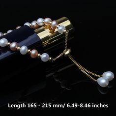 Adjustable Luxury Pearl Bracelet, Luxury Adjustable Round Pearl Bracelet, Elegant Adjustable Hand-strung Pearl Necklace, Adjustable Single Strand Pearl Bracelet, Elegant Rose Gold Pearl Bracelet With Round Beads, Gift Pearl Bracelet With High Luster, High Luster Pearl Bracelet With Round Beads As Gift, Gift Pearl Bracelet With High Luster Round Beads, Elegant Pearl Bracelet With 8mm Beads For Gifts